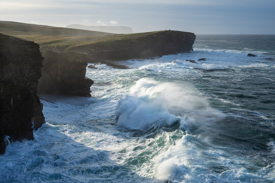 Waves crash into cliffs at Yesnaby, Orkney Islands, Scotland