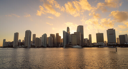 sunset over the city sun clouds life miami views