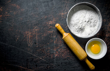 Flour a rolling pin and an egg.