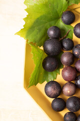 Top View Close Up of Bowl of Muscadine Grapes
