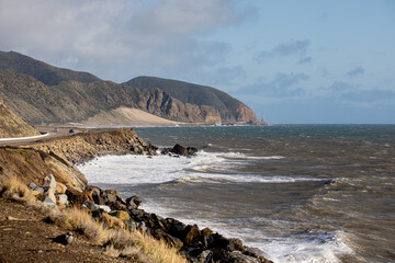 Far View of Ocean Beach Shore from Point Mugu Beach toward South Highway 1 E Pacific Coast Hwy during Winter Season with Strong Ocean Waves