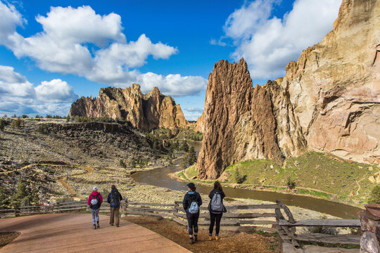Backpackers visiting Smith Rock State Park during sunny weather, Oregon, USA