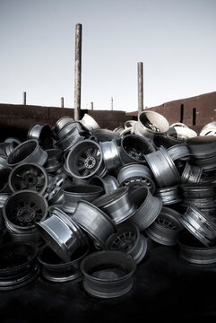 Pile of wheel rims at a recycling facility, Maine.