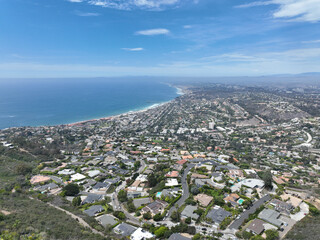 Aerial view over La Jolla Hills with big villas and ocean in the background, San Diego, California, USA