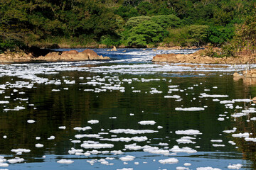 Foam of pollution on the Tiete River. Countryside of Sao Paulo state, Brazil