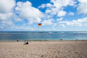 Obraz premium Beautiful view of Melasti Beach, a tropical beach, famous tourist destination located in Bali Island, Indonesia.
