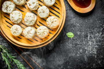 Hot manta dumplings with rosemary and soy sauce.