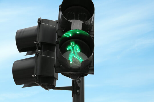 Traffic light for pedestrians on city street, closeup. Road rules