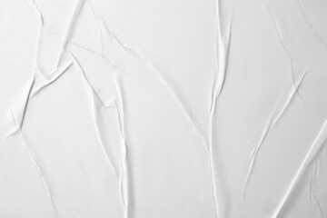 Texture of white creased paper, closeup view