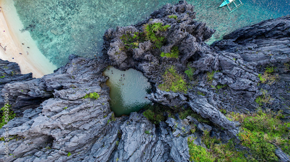 Wall mural overhead drone aerial of the secret lagoon in el nido, palawan, philippines. coral reef, crystal cle