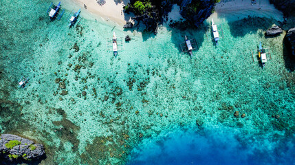 Aerial Image Of Catamarans In Crystal Clear Water In El Nido, Palawan, Philippines 3