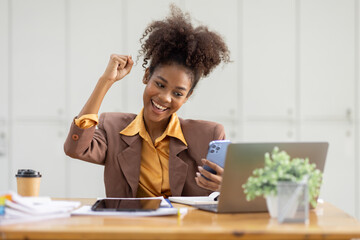 Excited happy Asian or african american woman business woman and phone screen in office for joy...