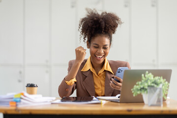 Excited happy Asian or african american woman business woman and phone screen in office for joy social media, internet browsing or research online win isolated over a white blur background