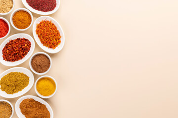 Various dried spices in small bowls