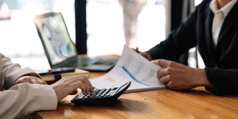 Business people are meeting for analysis data figures to plan business strategies. Business discussing concept