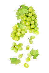 Green grapes levitate in the air isolated on white background.