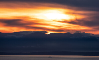 Fototapeta premium Vancouver Island Covered in Clouds during winter sunset. Viewed from Cypress Lookout, West Vancouver, British Columbia, Canada.