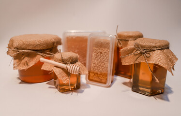 Collection of honey jars and pots mocked up for labelling