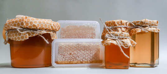 Collection of honey jars and pots mocked up for labelling