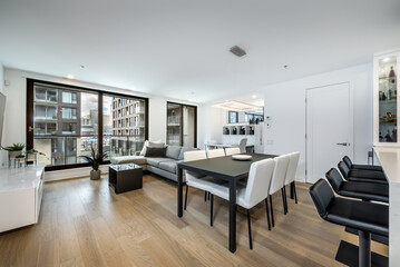 Luxury modern apartment in condominium in Montreal perfectly staged and furnished with amentinites common areas swimming pool, rooftop, terrace, gym, garden and city views
