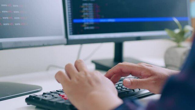 Closeup hand of developer programmer, software engineer, IT support, typing on computer keyboard