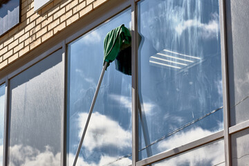 window washing, washing a street shop window