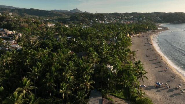 Sayulita, Mexico's main beach and town. Establishing Aerial Fly Drone View.