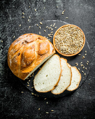 Pieces of crunchy bread with grains in a bowl.