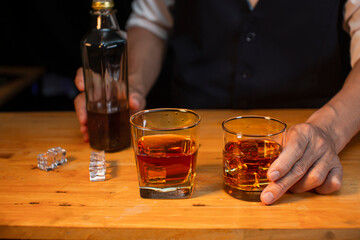 Bartender Serve Whiskey, on wood bar, 