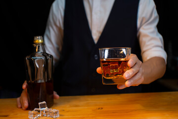 Bartender Serve Whiskey, on wood bar, 