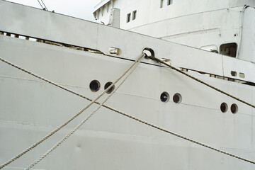 Ship portholes closed with hatches on board the ship.