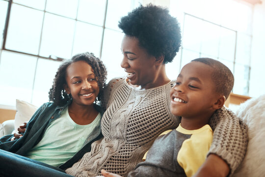 Love, Mother And Children Relax Sofa For Happy Family Time Together In Apartment In South Africa On Weekend. Smile Trust And Support, Black Woman And Kids Sitting On Couch With Healthy Relationship.