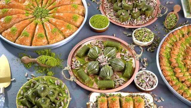 Traditional turkish baklava pistachio pastry. Dilberdudagi, ozel kesim baklava, cikolatali baklava, fistikli baklava, katmer, fistikli kadayif, kattafi, fistik sarma, soguk baklava, midye baklava, cev