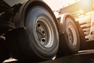 Big Semi Truck Wheels Tires. Rubber, Tyres. Tractor Truck. Freight Trucks Logistics Transport. Auto Service Shop.	