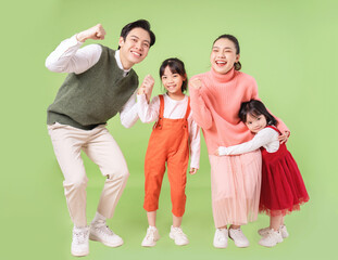 Fototapeta premium Image of young Asian family on background