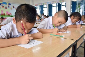 Students are playing games to promote Thai language skills in the classroom