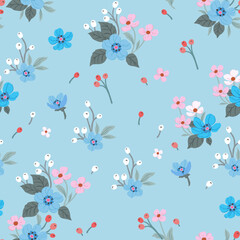 Pattern of cute spring flowers and berries on a blue background.
