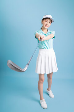Image of young Asian female golfer