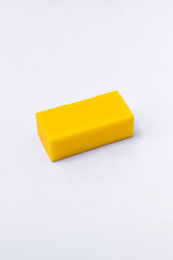 Yellow eraser isolated on white background