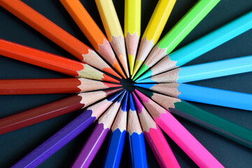 Naklejka premium Color pencils isolated on black background. Close up