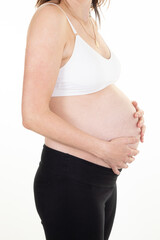 pregnant woman on white background side belly view in profile