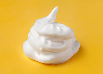 Shaving cream isolated on yellow color background	