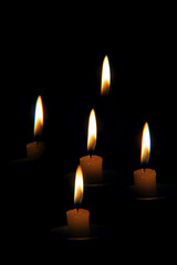 burning candles in the dark 