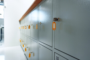 Gray locker with key for safety in public facility