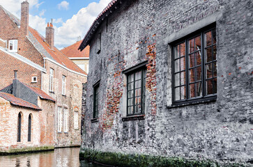 Bruges, Belgium; view of the medieval buildings that are crossed by the canals of the city. Historic center World Heritage