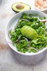 fresh avocado salad green leaves meal food snack on the table copy space food background rustic top view