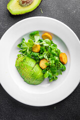 fresh avocado salad green leaves meal food snack on the table copy space food background rustic top view