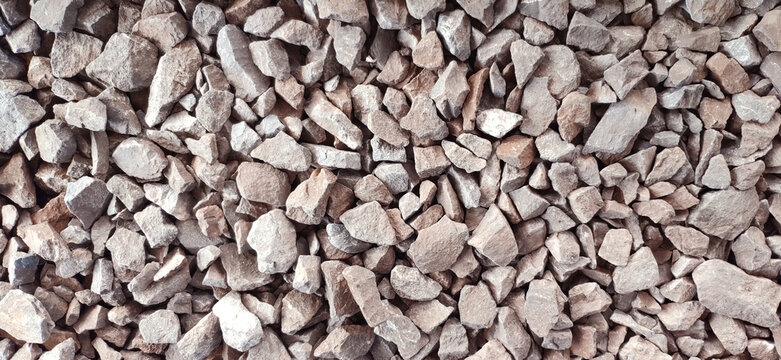 Crushed stones background on the railway