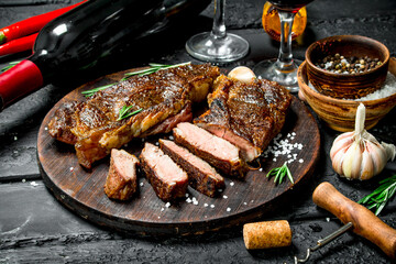 Grilled beef steaks with herbs and red wine.