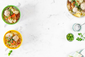 Spring bright soup with meatballs and vegetables. Copy space.
